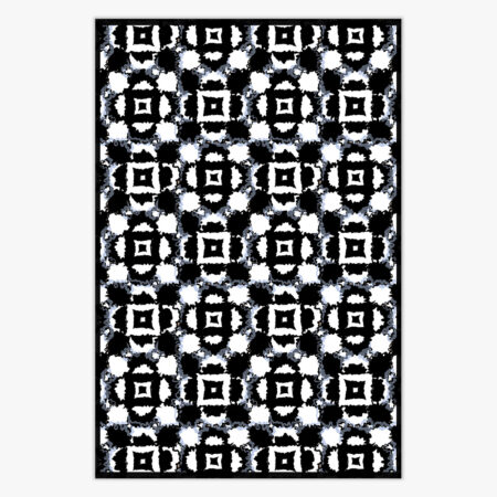 photo of a black and white floral pattern rug against a off white background