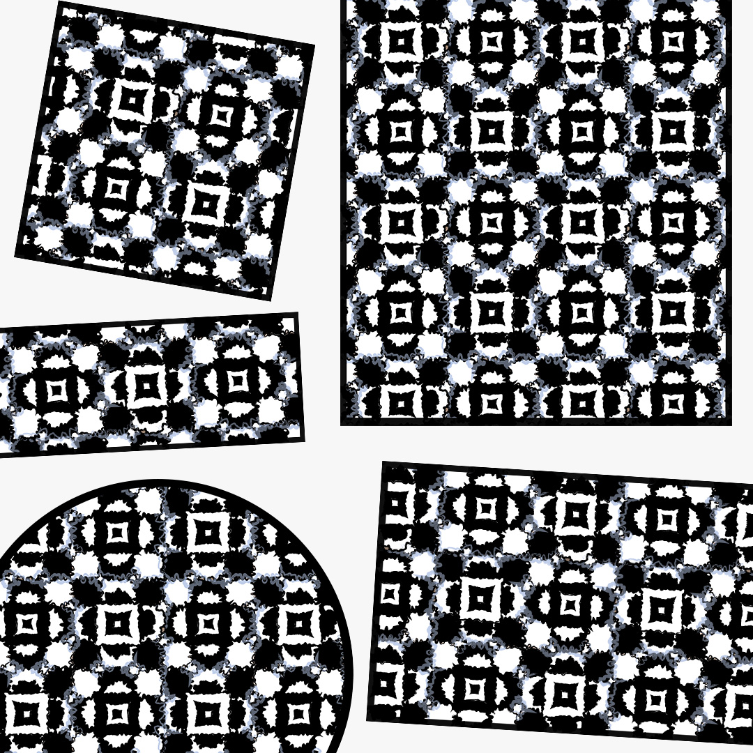photo of five different shapes of black and white floral pattern rug against a off white background