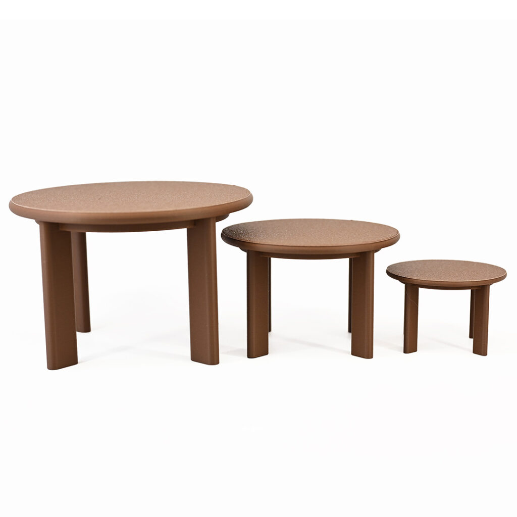 Three mini dining tables in descending sizes