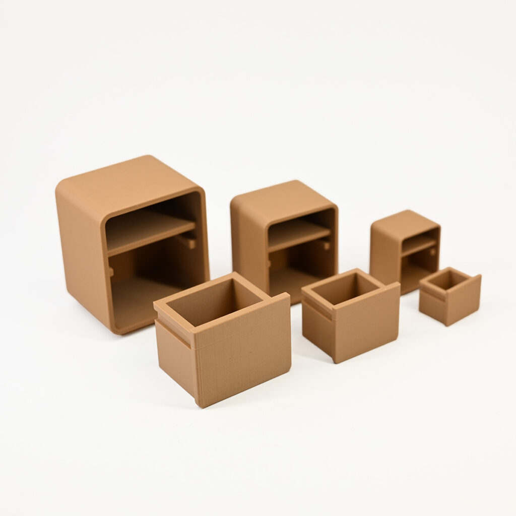 three sizes of tiny nightstands