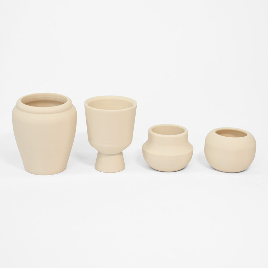 A row of tiny beige planters