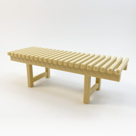 a photo of a tiny slated bench at an angle