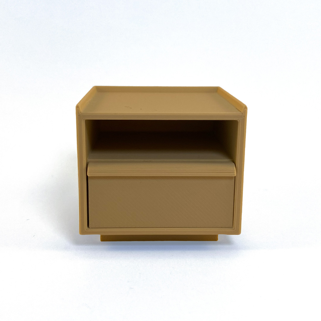 miniature nightstand in light brown against a white background
