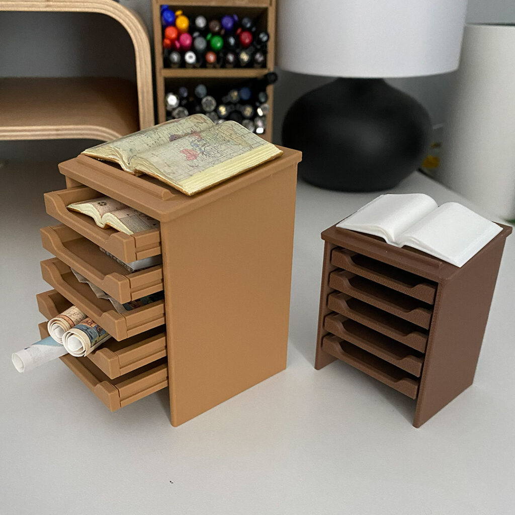 Side view of Mini atlas stands on a real desk