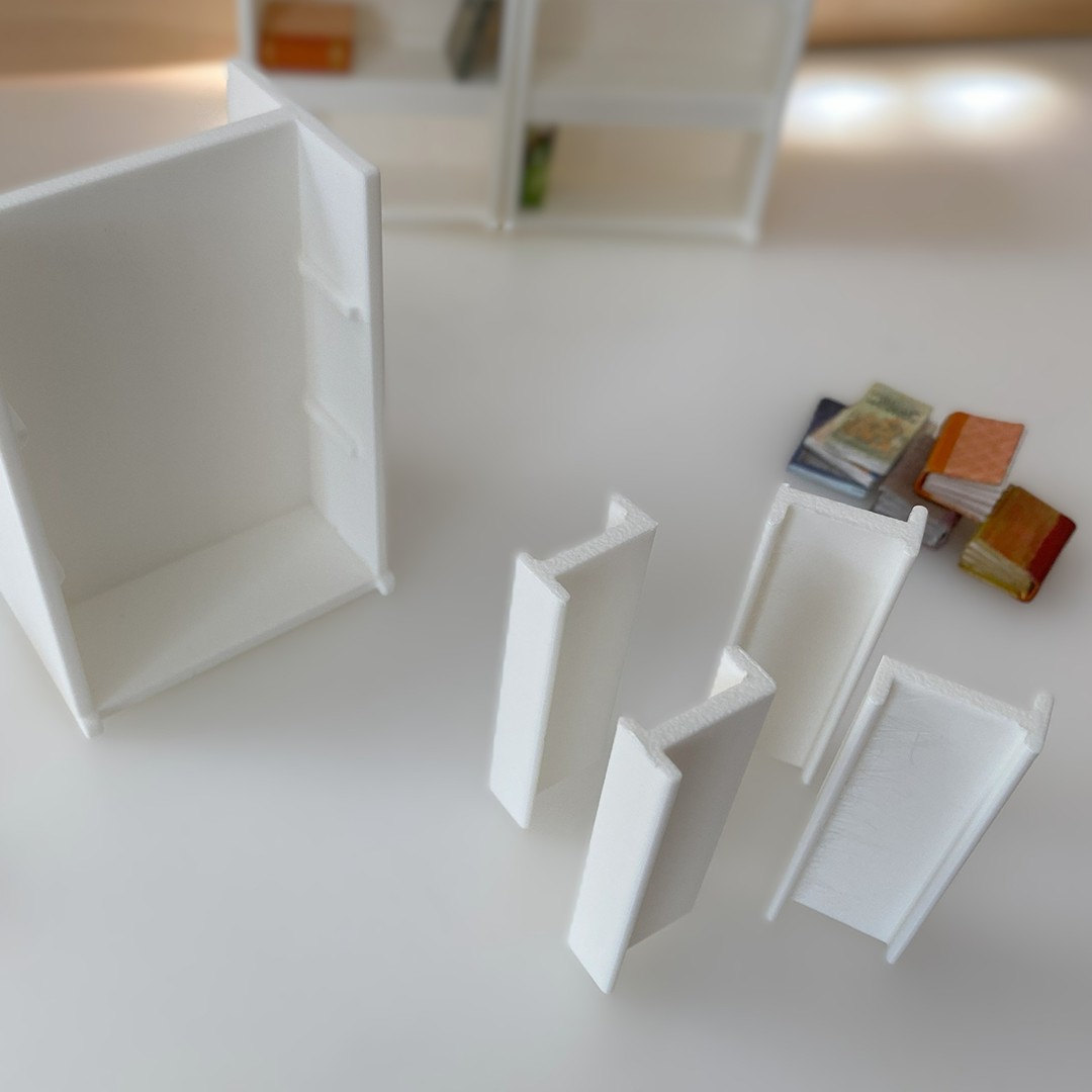 a photo of an empty tiny bookshelf with shelves removed from above